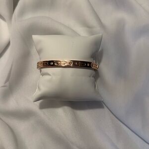 coach rose gold bangle